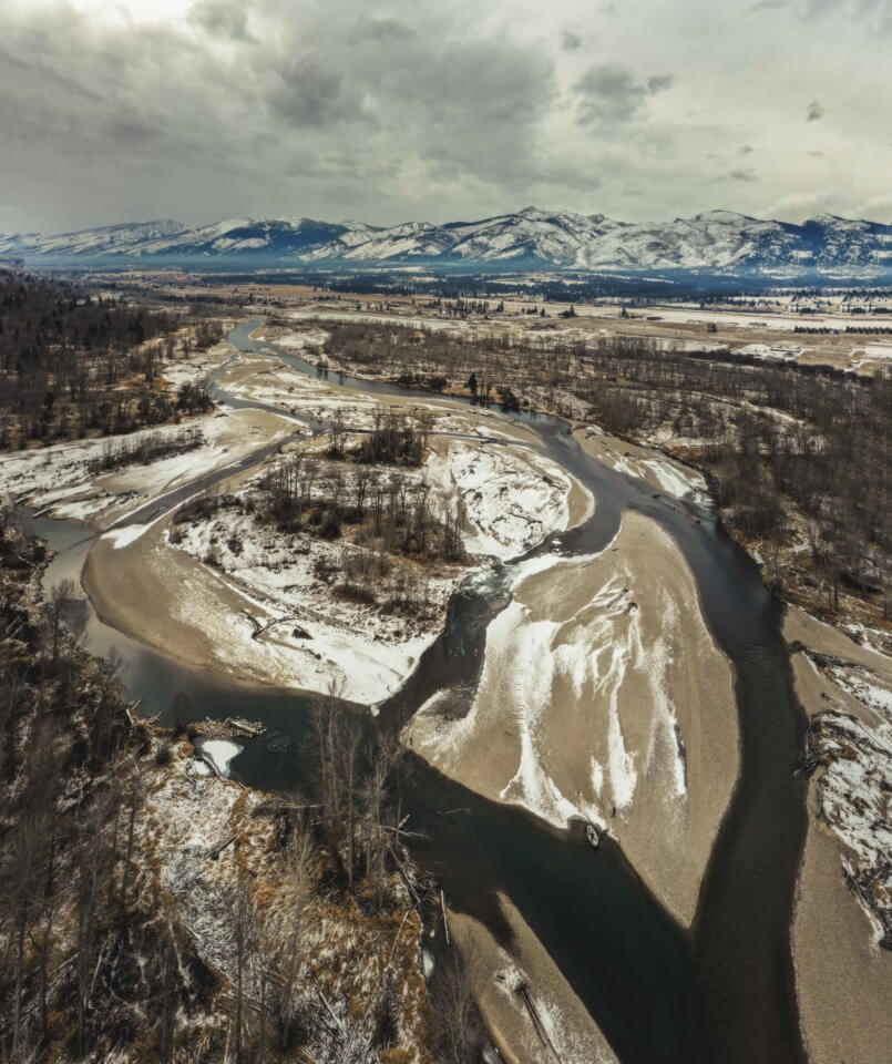 Aerial view of Montana river in winter.