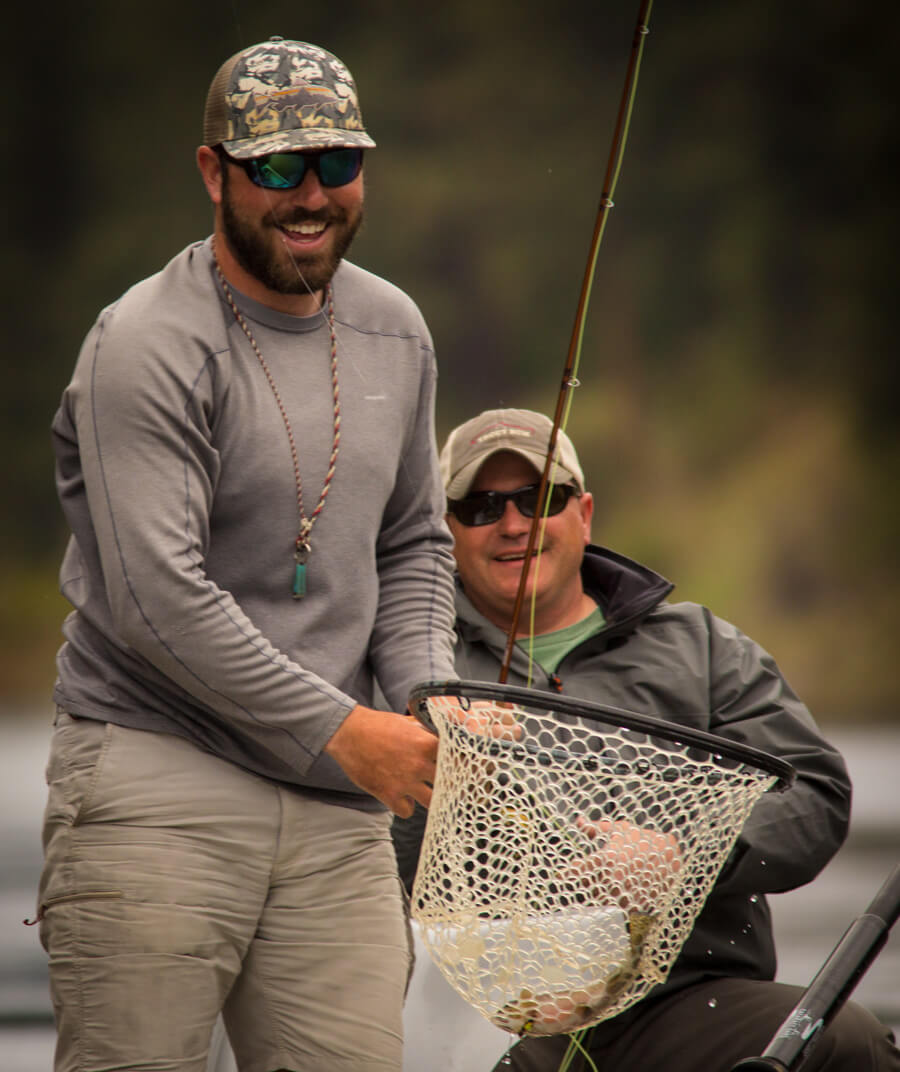 Two people fishing.